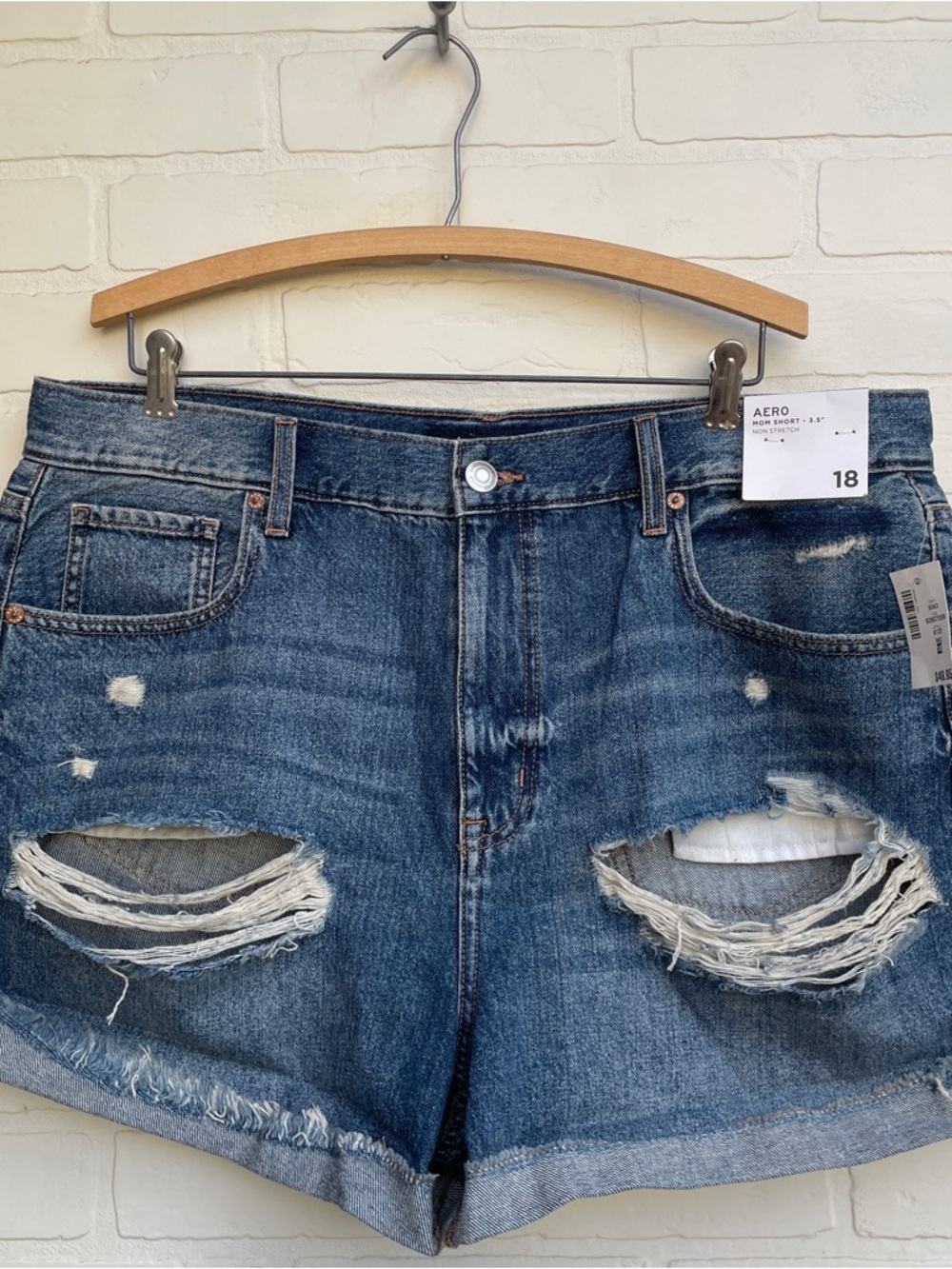AERO Distressed Denim Cutoff Shorts in Dark Blue mom short